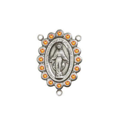 silver-plated Miraculous Medal centerpiece with birthstone crystal in topaz, 7/8 x 1/2 inch, Bliss Manufacturing