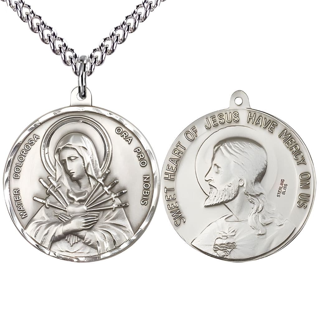Bliss Mater Dolorosa | Seven Dolorsand the  Sacred Heart of Jesus Sterling Silver Medal with sterling silver chain. Made in the USA by Bliss, deluxe gift box. Measures: 1 1/2-inch tall by 1 1/2-inch wide.
