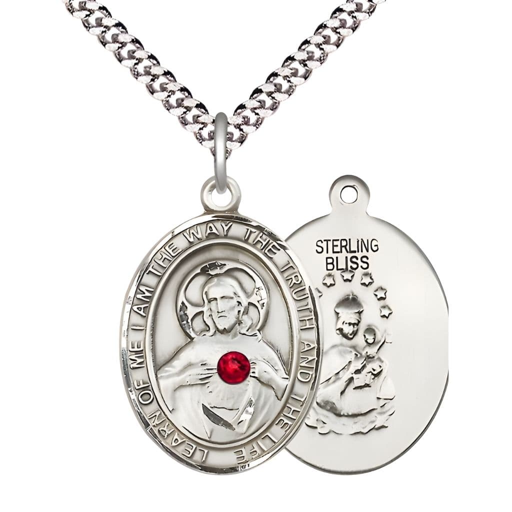 Bliss Red Crystal Sacred Heart of Jesus Scapular Sterling Silver Oval Medal Pendant with Rhodium-plated Chain, Measures 1-inch tall by 3/4-inch wide. Deluxe Gift Box.