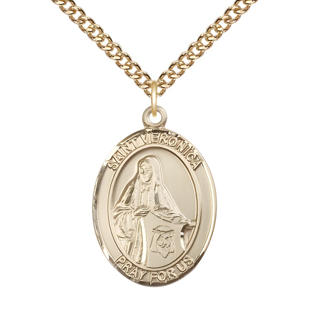 Bliss St. Veronica 14kt Gold Oval Medal Pendant with 14kt Gold Chain, Measures 1-inch tall by 3/4-inch wide.