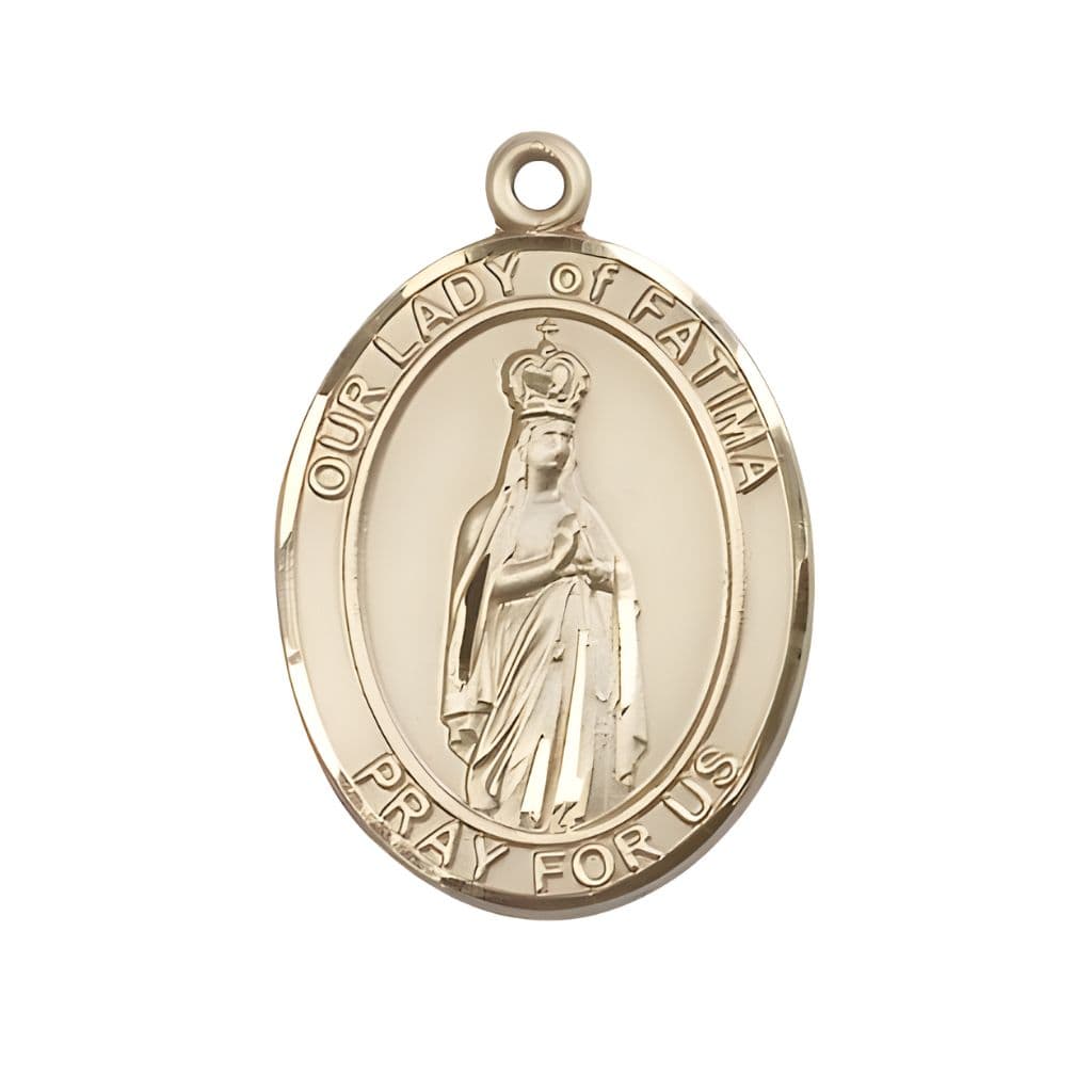 Bliss Our Lady of Fatima 14kt Gold Oval Medal Pendant, Measures 1-inch tall by 3/4-inch wide. Deluxe Gift Box.