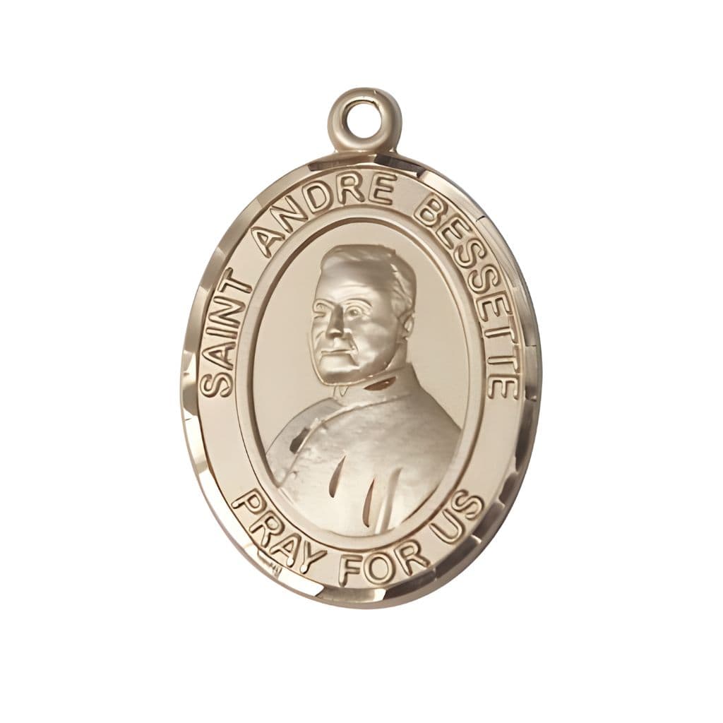 Bliss St. Andre Bessette 14kt Gold Oval Medal Pendant, Measures 1-inch tall by 3/4-inch wide.