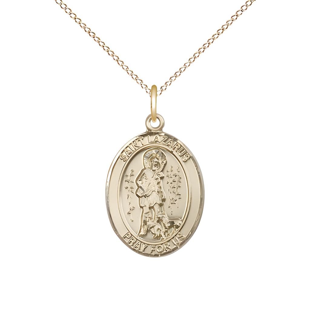 Bliss St. Lazarus 14kt Gold Oval Medal Pendant with 14kt Gold Chain, Measures 3/4-inch tall by 1/2-inch wide.