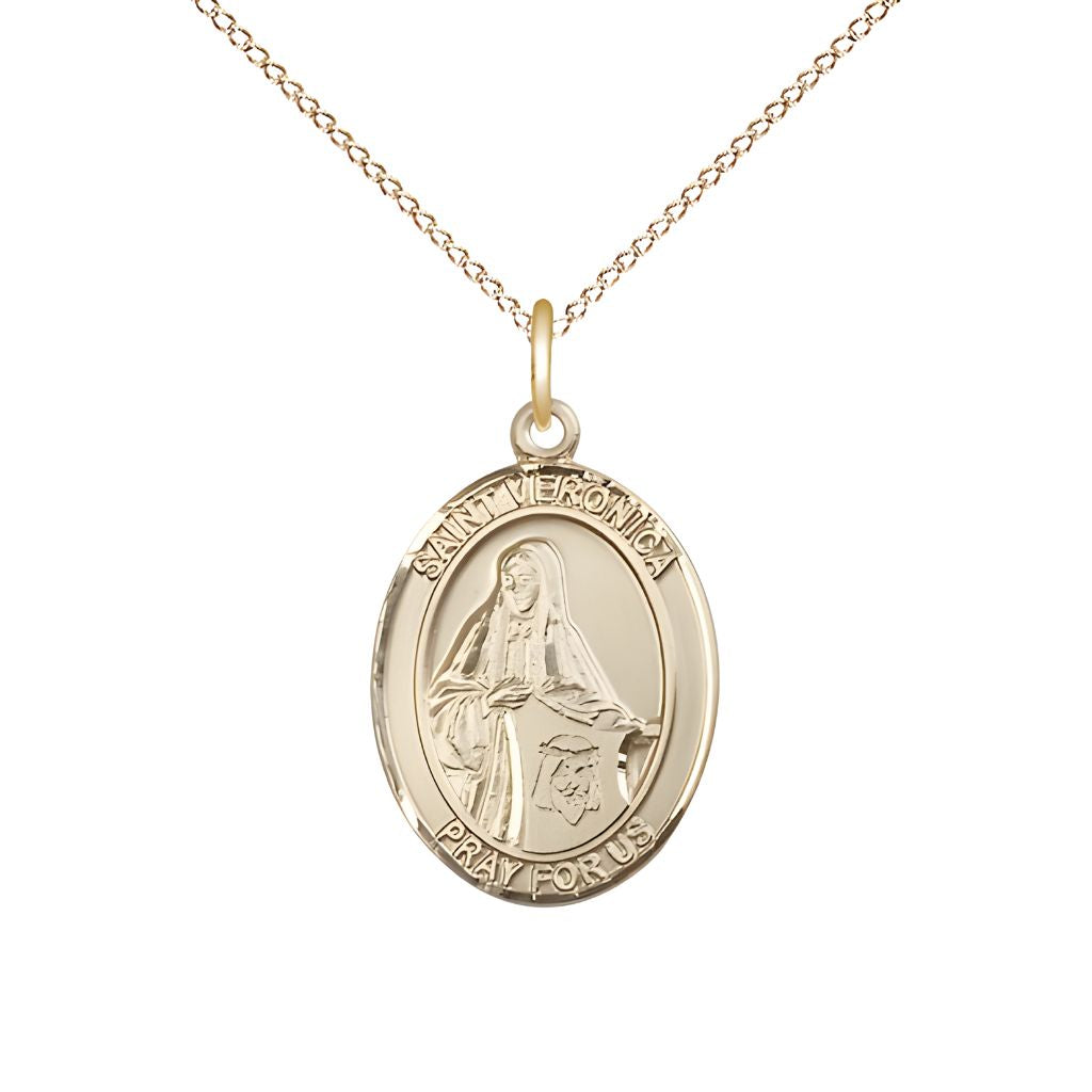 Bliss St. Veronica 14kt Gold Oval Medal Pendant with 14kt Gold Chain, Measures 3/4-inch tall by 1/2-inch wide.