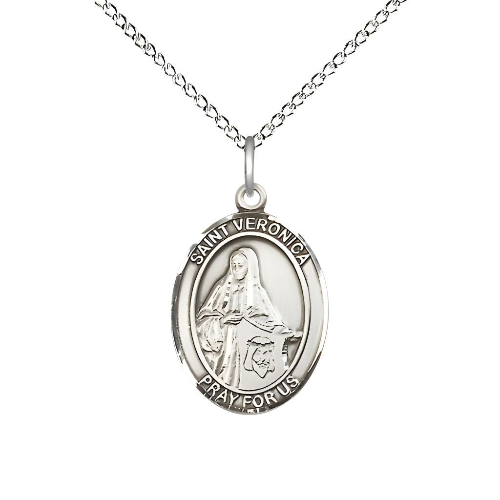 Bliss St. Veronica Sterling Silver Oval Medal Pendant with Sterling Chain, Measures 3/4-inch tall by 1/2-inch wide.