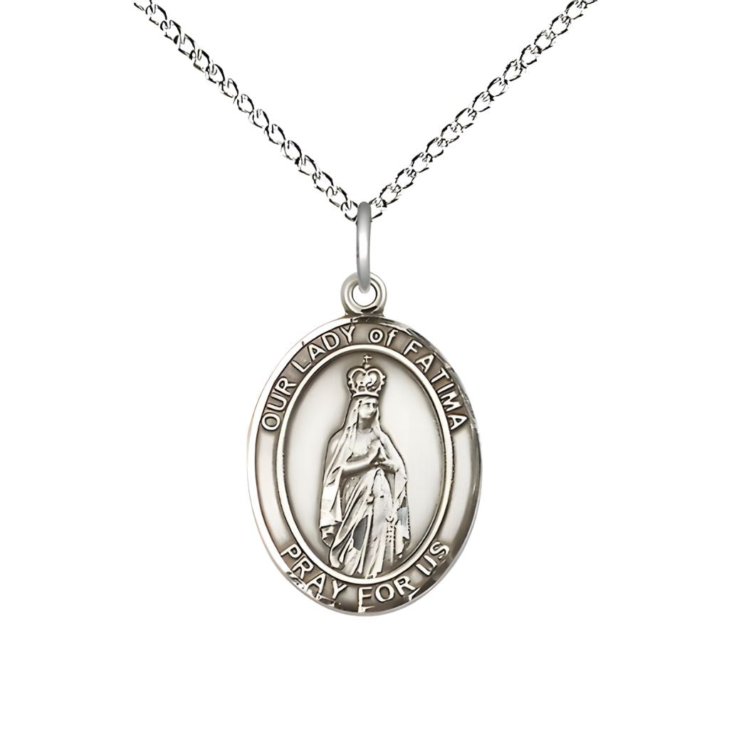 Bliss Our Lady of Fatima Sterling Silver Oval Medal Pendant with Sterling Silver Chain, Measures 3/4-inch tall by 1/2-inch wide. Deluxe Gift Box.