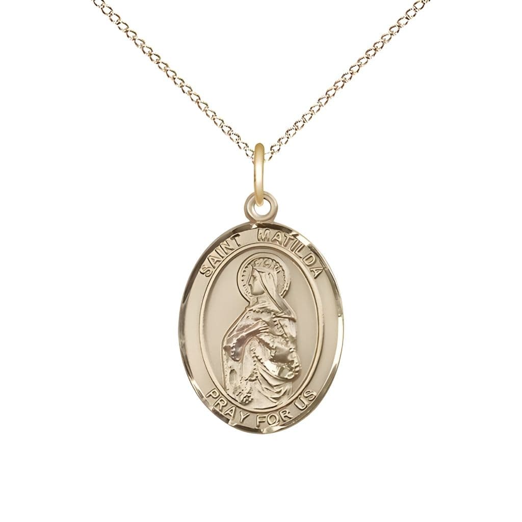 Bliss St. Matilda 14kt Gold Oval Medal Pendant with 14kt Gold Chain, Measures 3/4-inch tall by 1/2-inch wide.