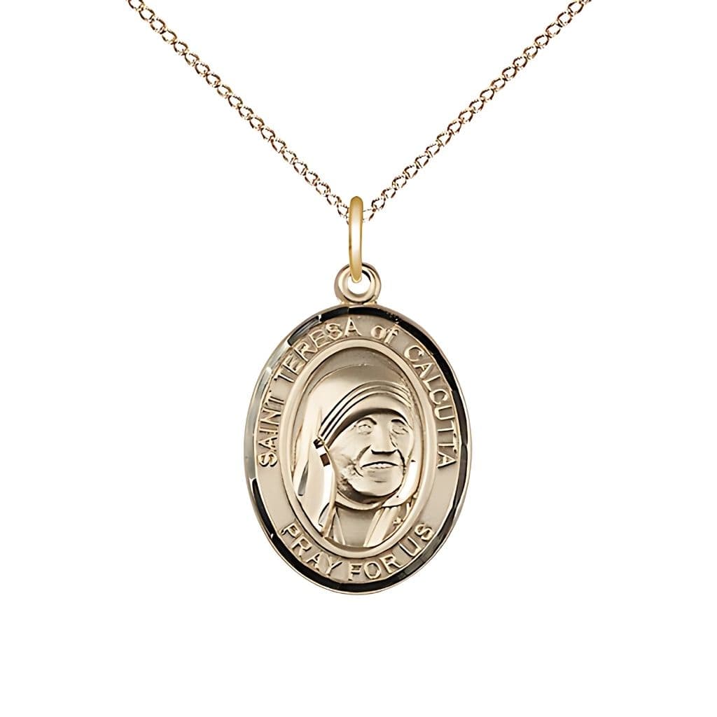 Bliss 14kt Gold Saint Teresa of Calcutta Pendant on a 18 inch 14kt Gold Light Curb Chain, Measures 3/4-inch tall by 1/2-inch wide