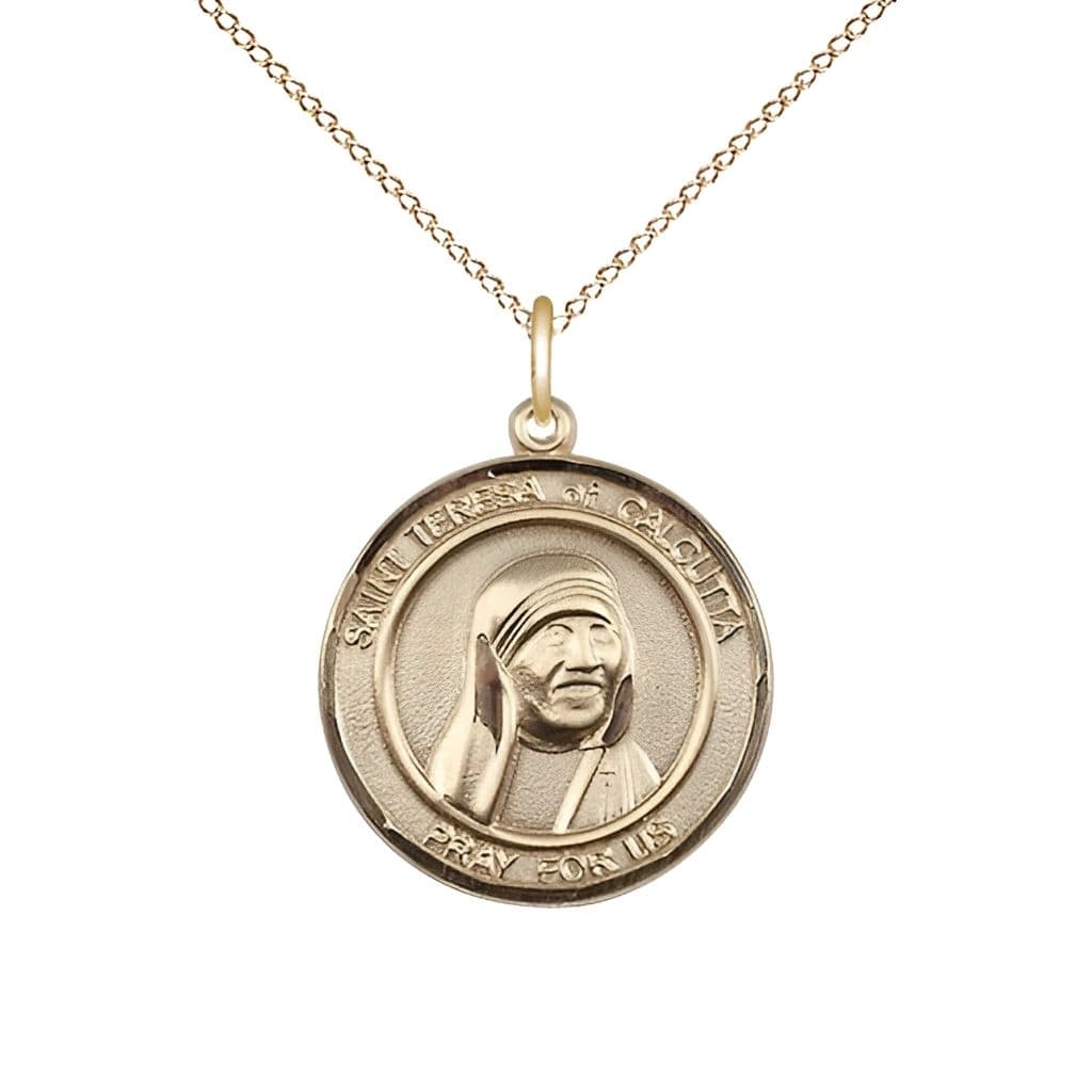 St. Teresa of Calcutta 14kt Gold Round Medal with 14kt Gold Light Curb Chain by Bliss Manufacturing, 3/4-inch tall by 5/8 - inch wide