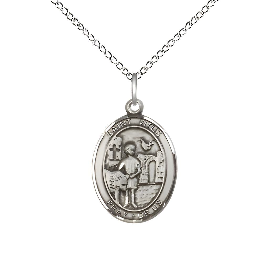 Bliss St. Vitus Sterling Silver Oval Medal Pendant with Sterling Chain, Measures 3/4-inch tall by 1/2-inch wide.