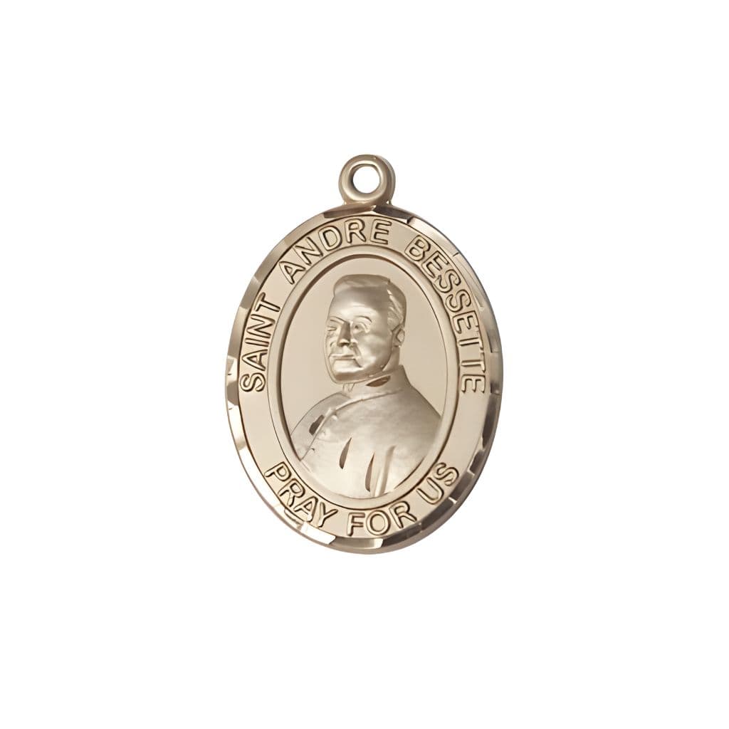 Bliss St. Andre Bessette 14kt Gold Oval Medal Pendant, Measures 3/4-inch tall by 1/2-inch wide.