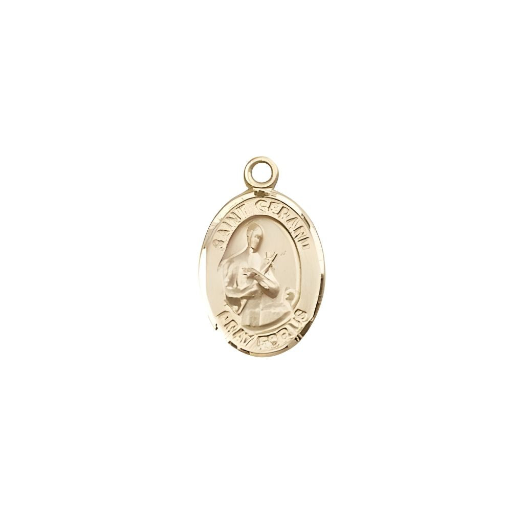 Bliss St. Gerard Majella 14kt Gold Oval Small Children Medal, Measures 1/2-inch tall by 1/4-inch wide.