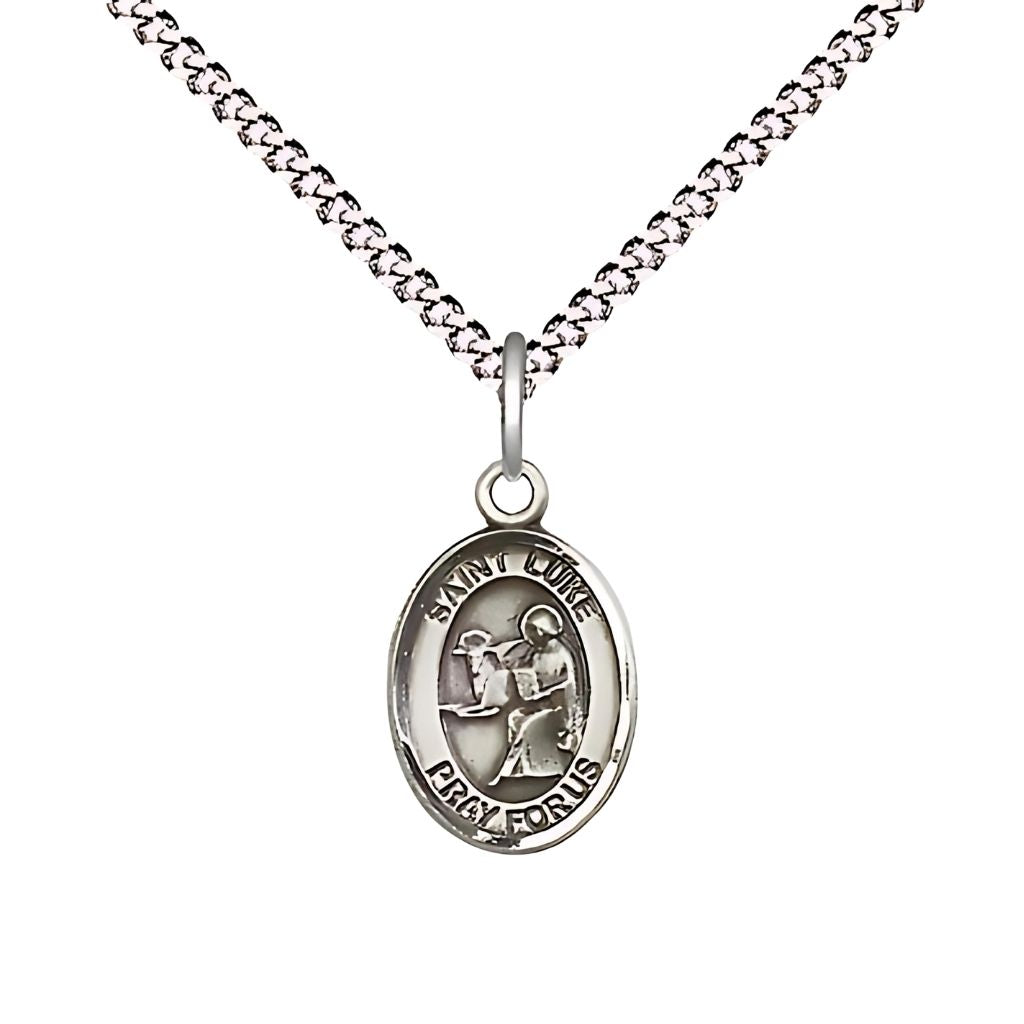 Bliss St. Luke the Apostle Engravable Small Children Pewter Medal with Rhodium-plated Chain, Measures 1/2-inch tall by 1/4-inch wide.