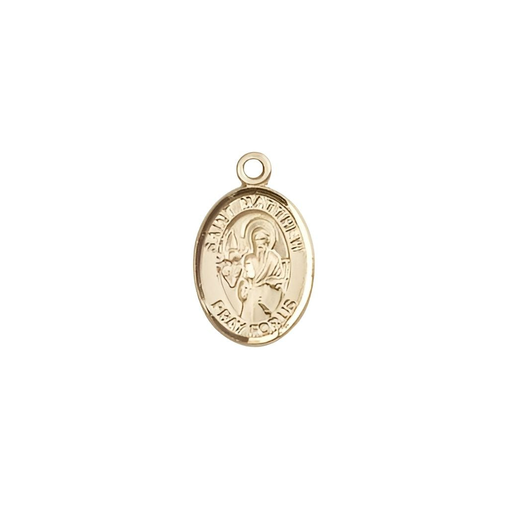 Bliss St. Matthew the Apostle 14kt Gold Oval Small Children Medal, Measures 1/2-inch tall by 1/4-inch wide.
