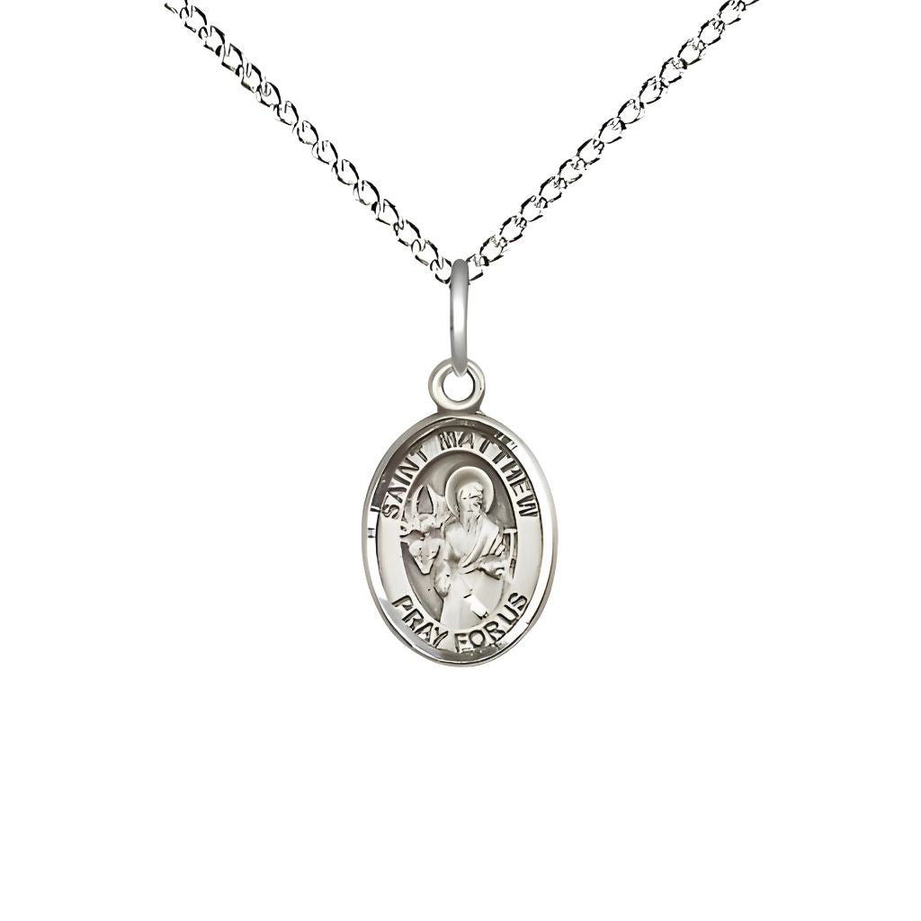 Bliss St. Matthew the Apostle Sterling Silver Oval Children Medal with Sterling Silver Chain, Measures 1/2-inch tall by 1/4-inch wide.