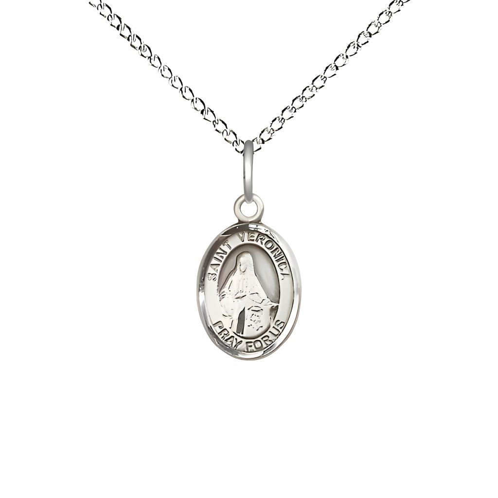 Bliss St. Veronica Engravable Small Children Sterling Silver Medal with Sterling Chain, Measures 1/2-inch tall by 1/4-inch wide.