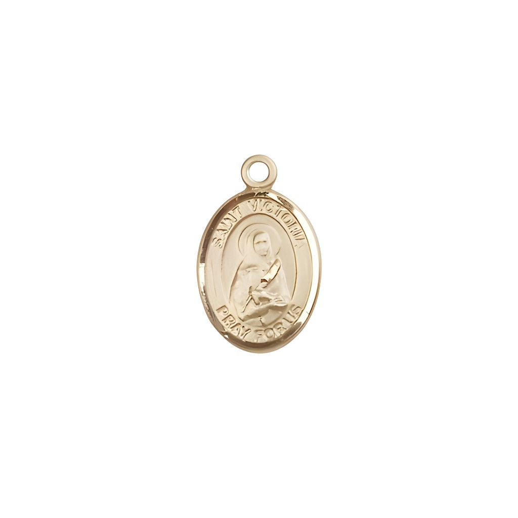 Bliss St. Victoria 14kt Gold Oval Small Children Medal, Measures 1/2-inch tall by 1/4-inch wide.