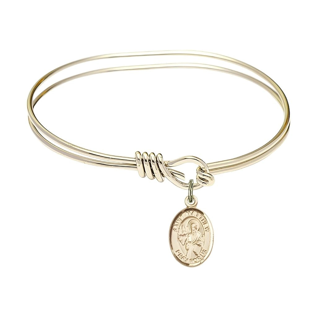 Bliss St. Matthew the Apostle 14kt Gold-filled Charm Oval Eye Hook Bangle Bracelet, charm measures 1/2 by 1/4 inch