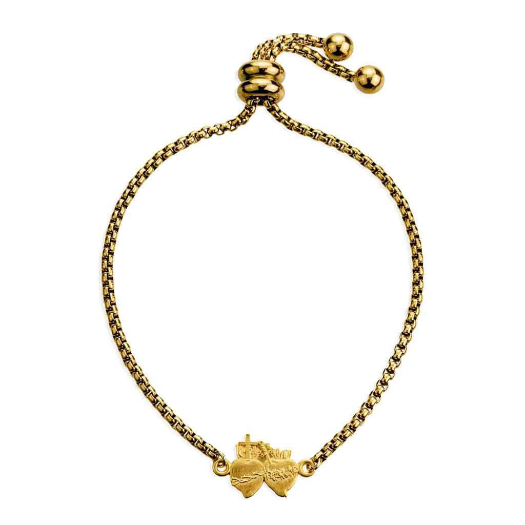 A Sacred Heart of Jesus gold-plated chain bracelet with a double-heart charm with flames, sword and cross, adjustable sliding bead closure.