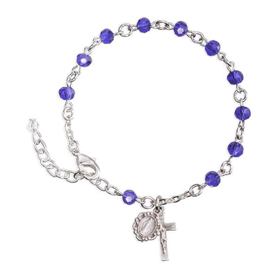 Silver Tone Catholic Rosary Bracelet with Caribbean Blue 5mm faceted crystal beads and a silver oxidized Miraculous Medal and crucifix