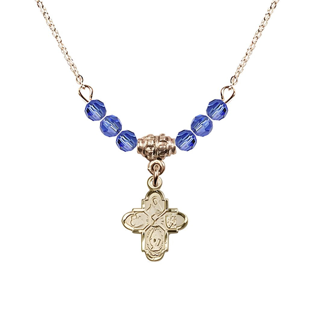 Bliss Gold-plated Chalice 4-Way Cross Sapphire Beaded Necklace, Measures 1/2-inch tall by 3/8-inch wide