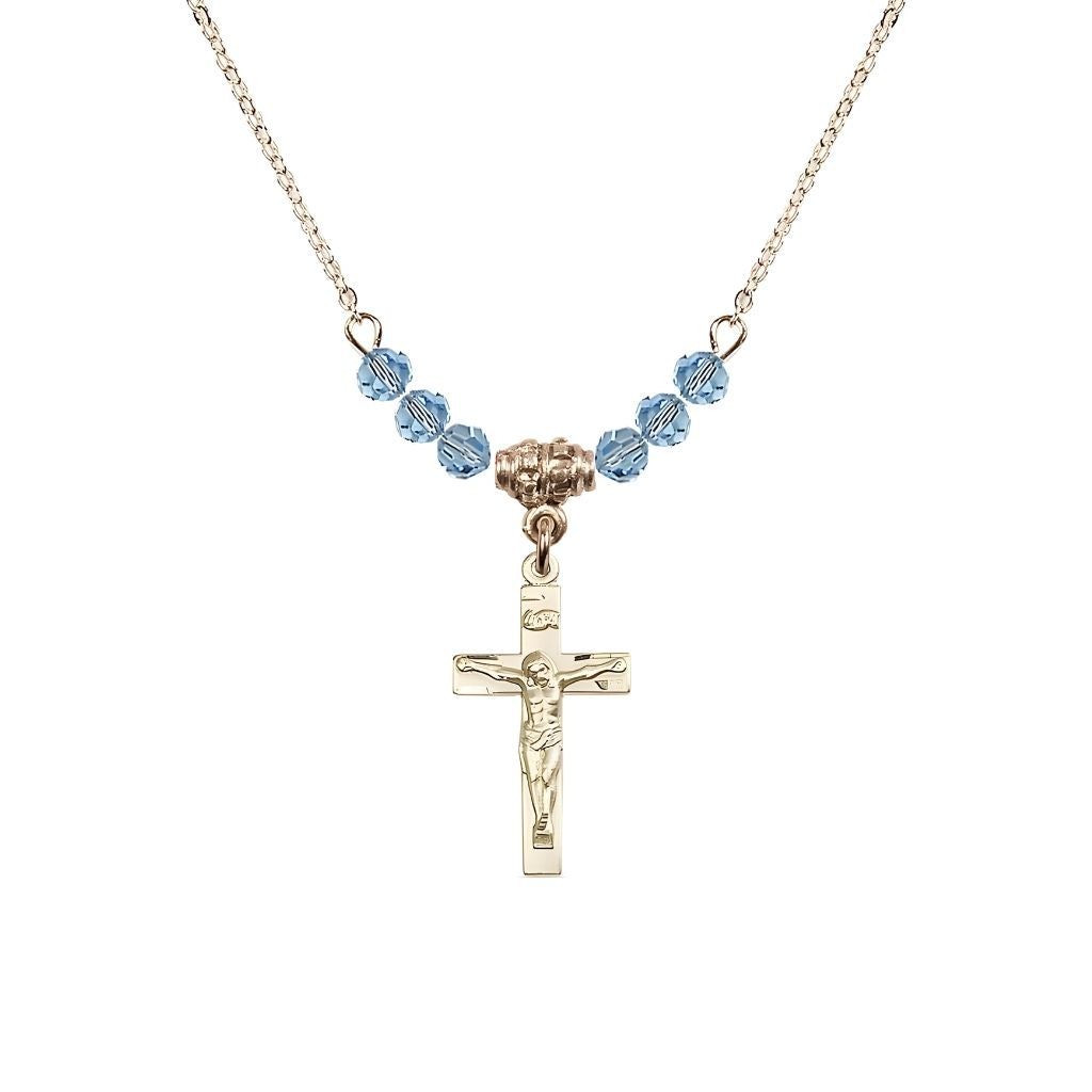 Bliss Gold-plated Holy Communion Crucifix Aqua Beaded Necklace, Measures 1/2-inch tall by 3/8-inch wide