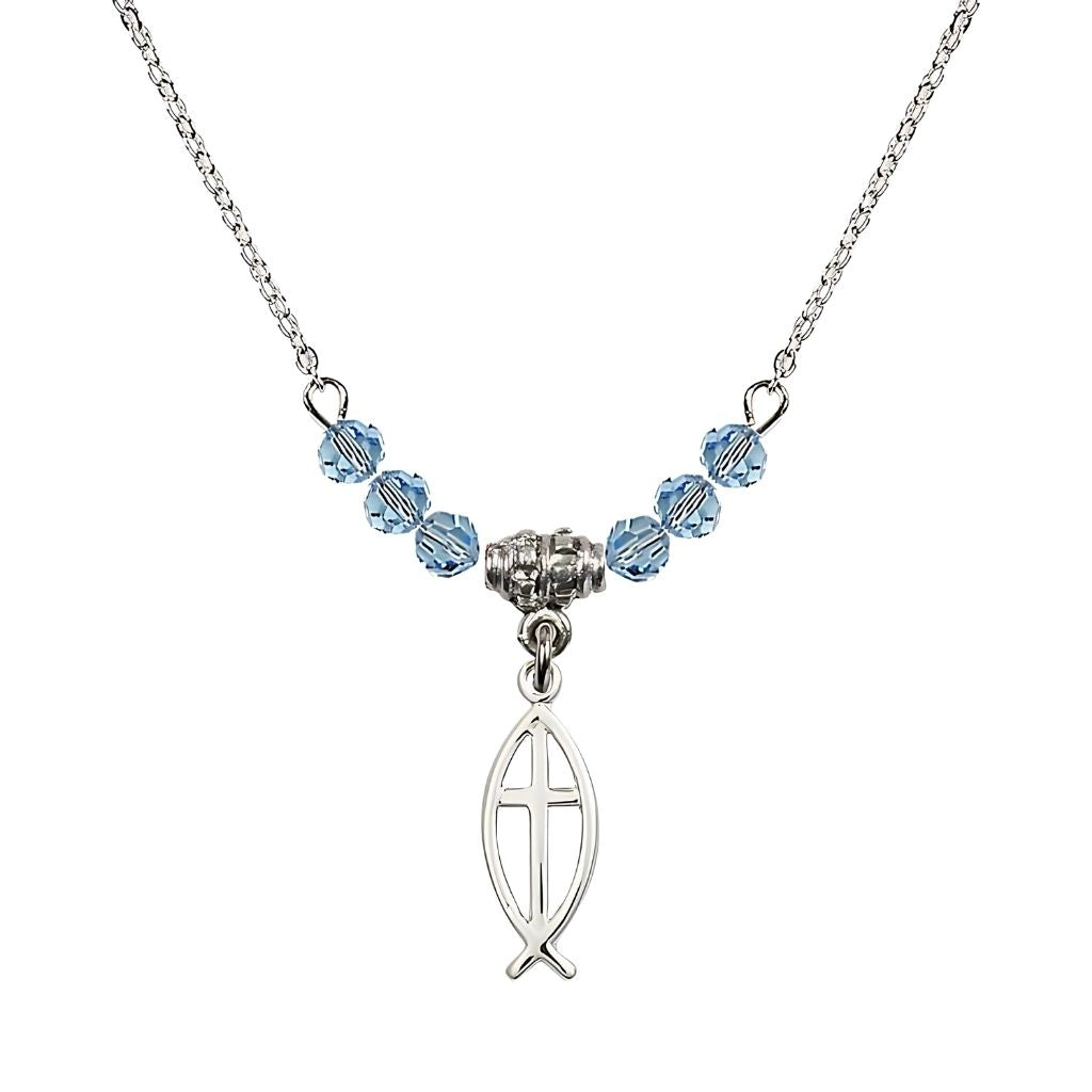 Bliss Fish Cross Crystal Birthstone Necklace with Chain in Aqua, 3/4 inch tall by 1/4 inch wide