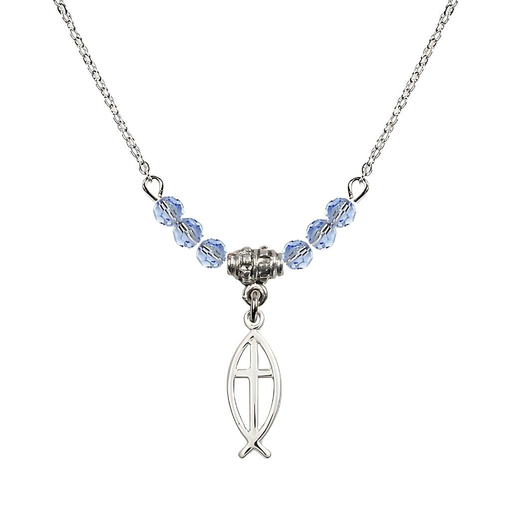 Bliss Fish Cross Crystal Birthstone Necklace with Chain in Light Sapphire, 3/4 inch tall by 1/4 inch wide