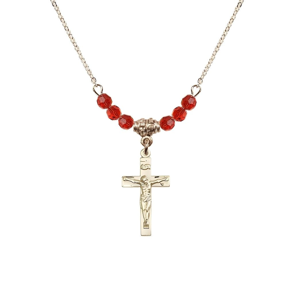 Bliss Gold-plated Holy Communion Crucifix Ruby Beaded Necklace, Measures 1/2-inch tall by 3/8-inch wide