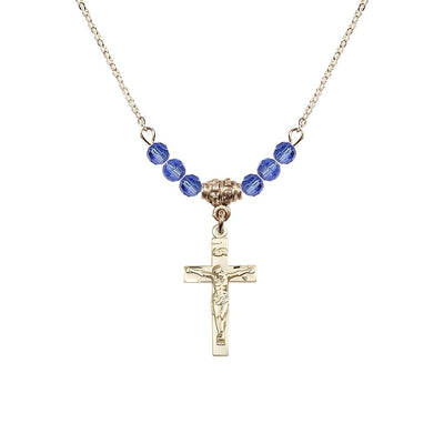 Gold-plated Holy Communion Crucifix Sapphire Beaded Necklace, Measures 1/2-inch tall by 3/8-inch wide, Bliss Manufacturing