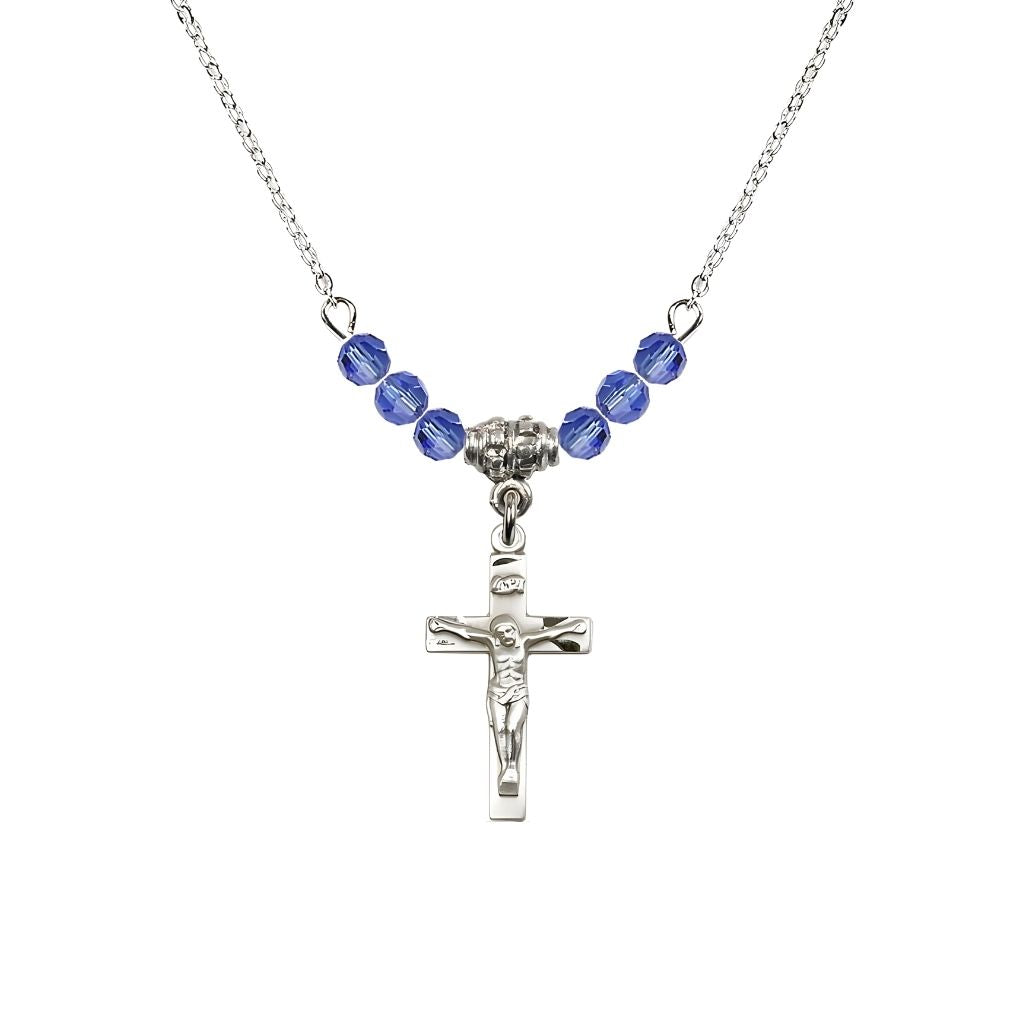 Bliss Pewter Holy Communion Crucifix Sapphire Beaded Necklace, Measures 1/2-inch tall by 3/8-inch wide