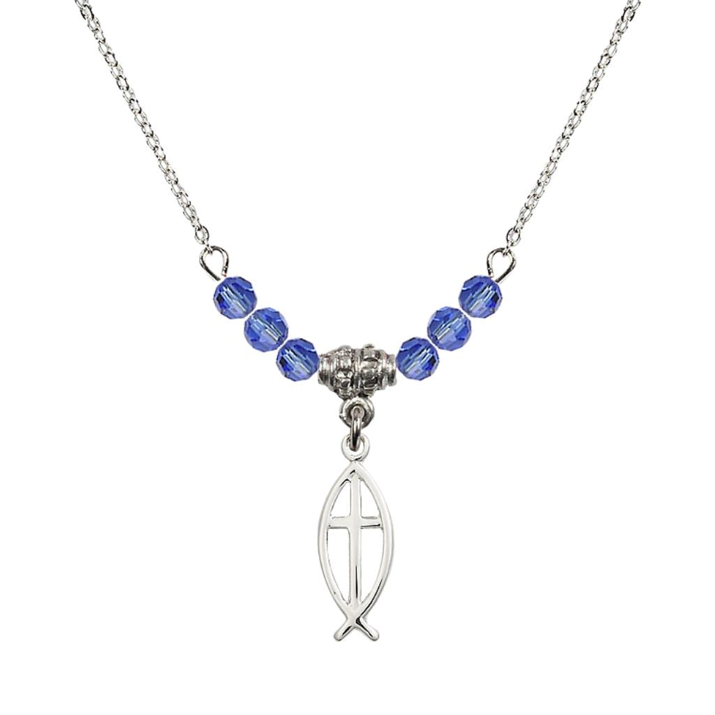Bliss Fish Cross Crystal Birthstone Necklace with Chain in Sapphire, 3/4 inch tall by 1/4 inch wide