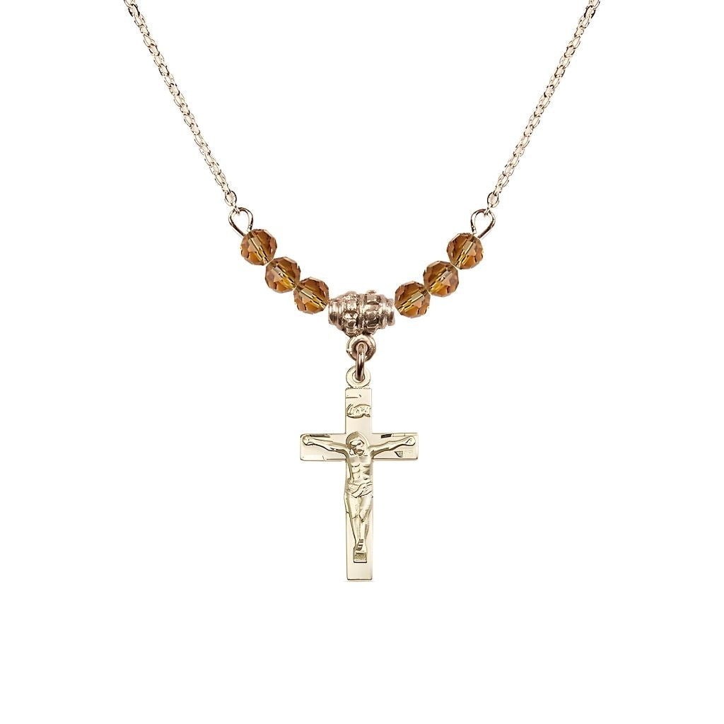 Bliss Gold-plated Holy Communion Crucifix Topaz Beaded Necklace, Measures 1/2-inch tall by 3/8-inch wide