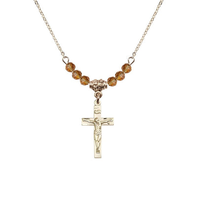 Gold-plated Holy Communion Crucifix Topaz Beaded Necklace, Measures 1/2-inch tall by 3/8-inch wide, Bliss Manufacturing