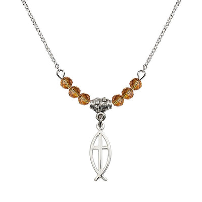 Fish Cross Crystal Birthstone Necklace with Chain in Topaz, 3/4 inch tall by 1/4 inch wide, Bliss Manufacturing