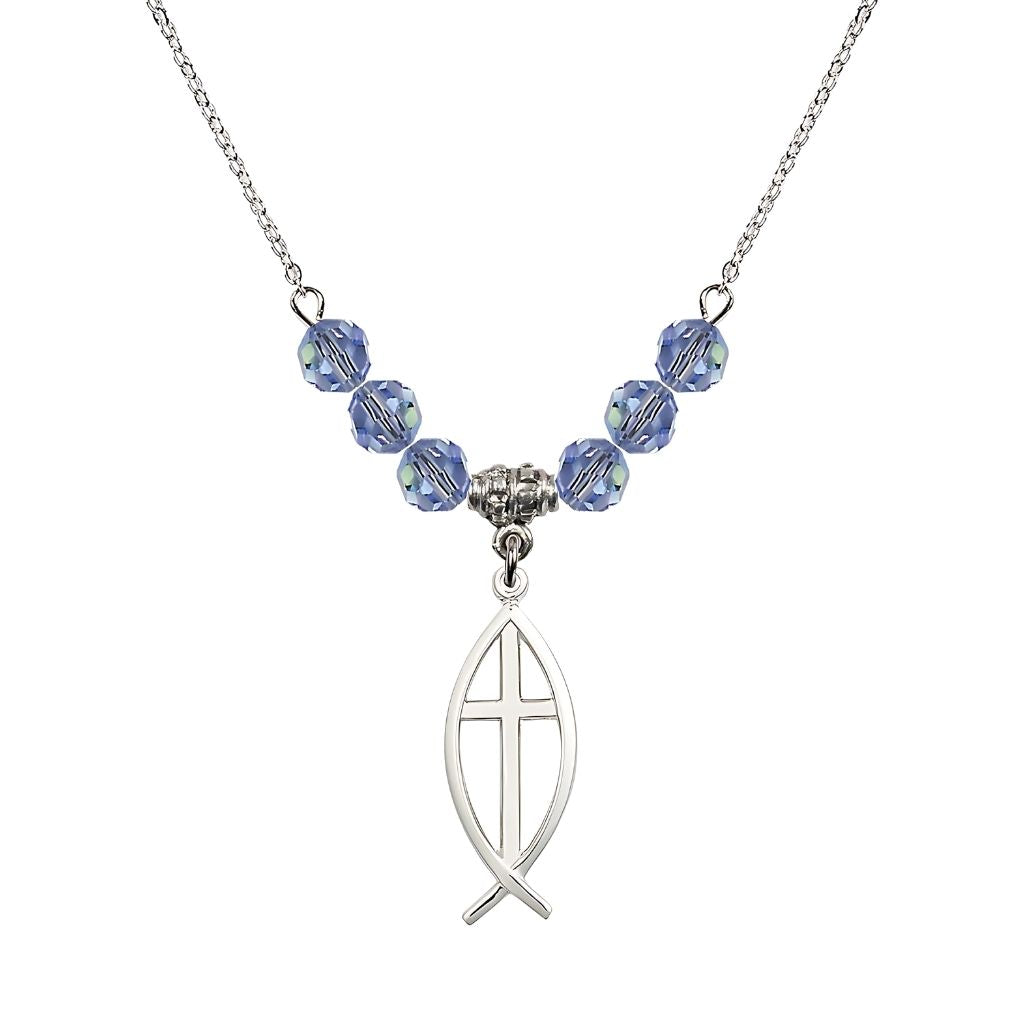 Bliss Fish Cross Crystal Birthstone Necklace with 18-inch Chain in Light Sapphire, Medal 1 inch tall by 3/8 inch wide
