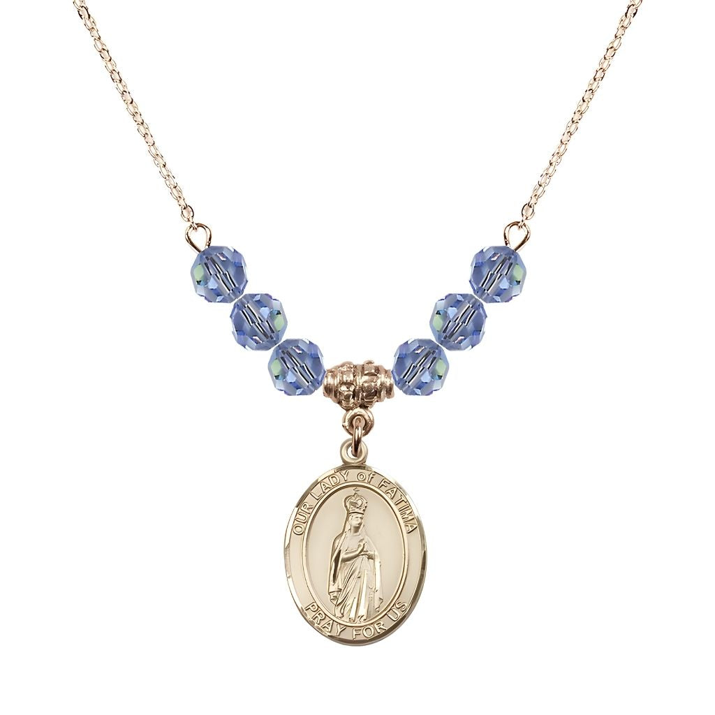 Bliss Our Lady of Fatima Gold-filled 6mm Light Sapphire Beaded Necklace, Measures 3/4 inch tall by 1/2-inch wide, Gift Box