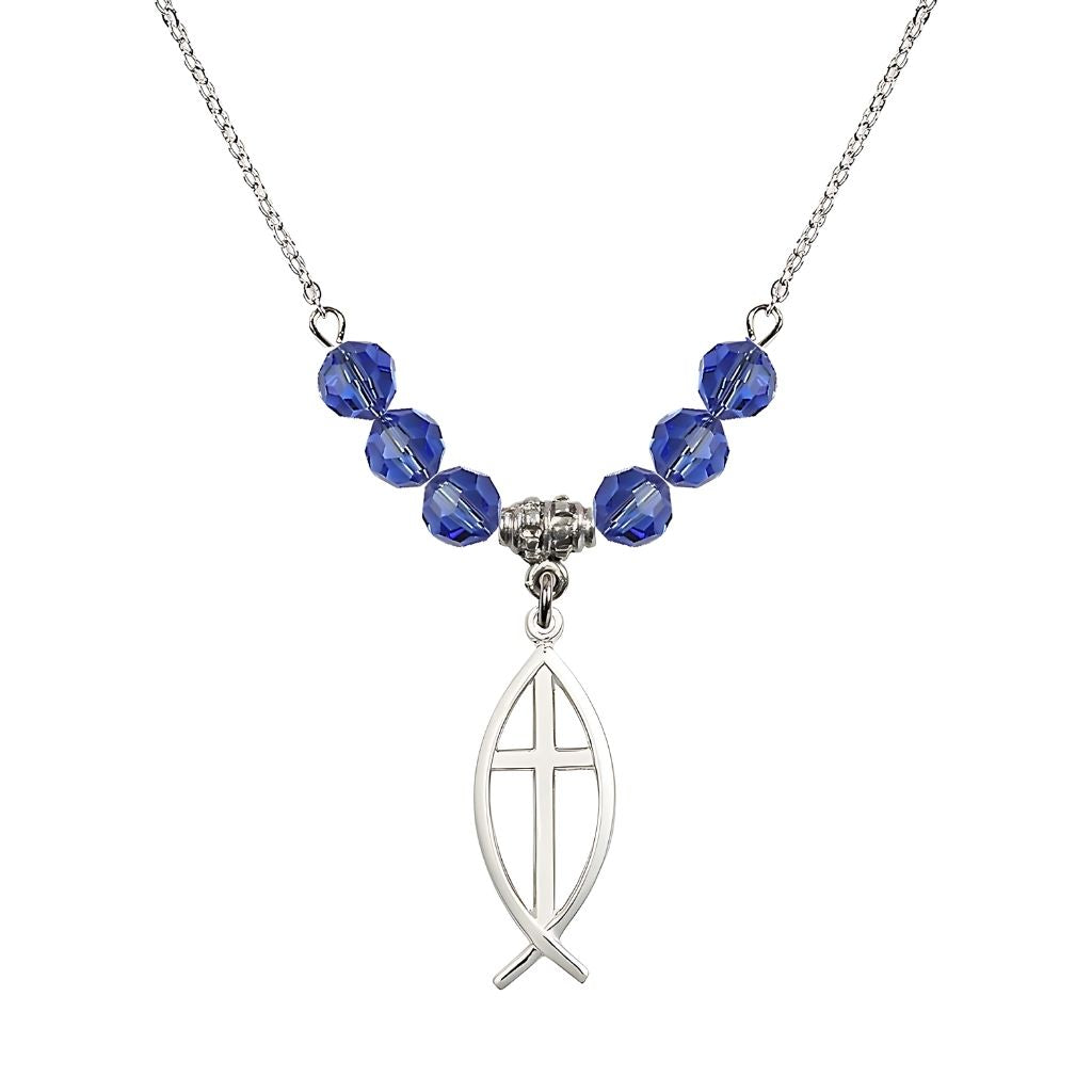 Bliss Fish Cross Crystal Birthstone Necklace with 18-inch Chain in Sapphire, Medal 1 inch tall by 3/8 inch wide