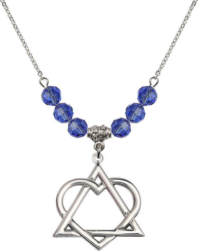 18" Rhodium Plated Necklace with 6mm Sapphire Crystal Beads featuring a Sterling Silver Adoption Heart Medal,