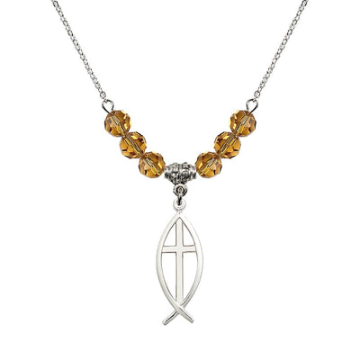 Fish Cross Crystal Birthstone Necklace with 18-inch Chain in Topaz, Medal 1 inch tall by 3/8 inch wide, Bliss Manufacturing