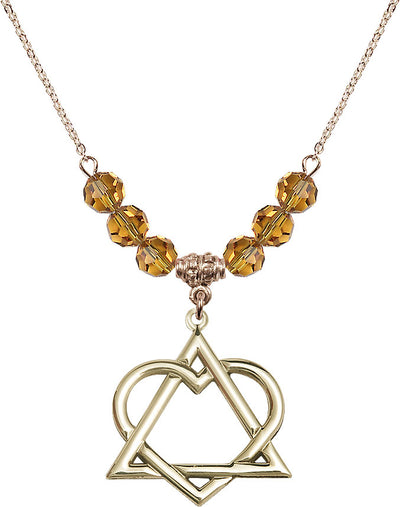 Hamilton Gold Plated Necklace with 6mm Rose Crystal Beads featuring a 14kt Gold Filled Adoption Heart in Topaz, Bliss Manufacturing