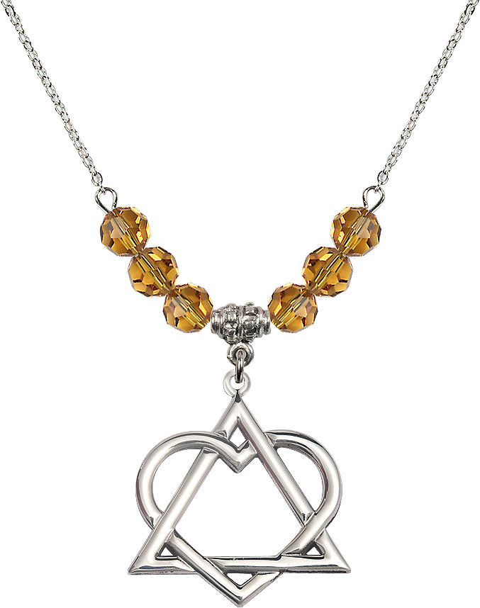 18" Rhodium Plated Necklace with 6mm Topaz Crystal Beads featuring a Sterling Silver Adoption Heart Medal,