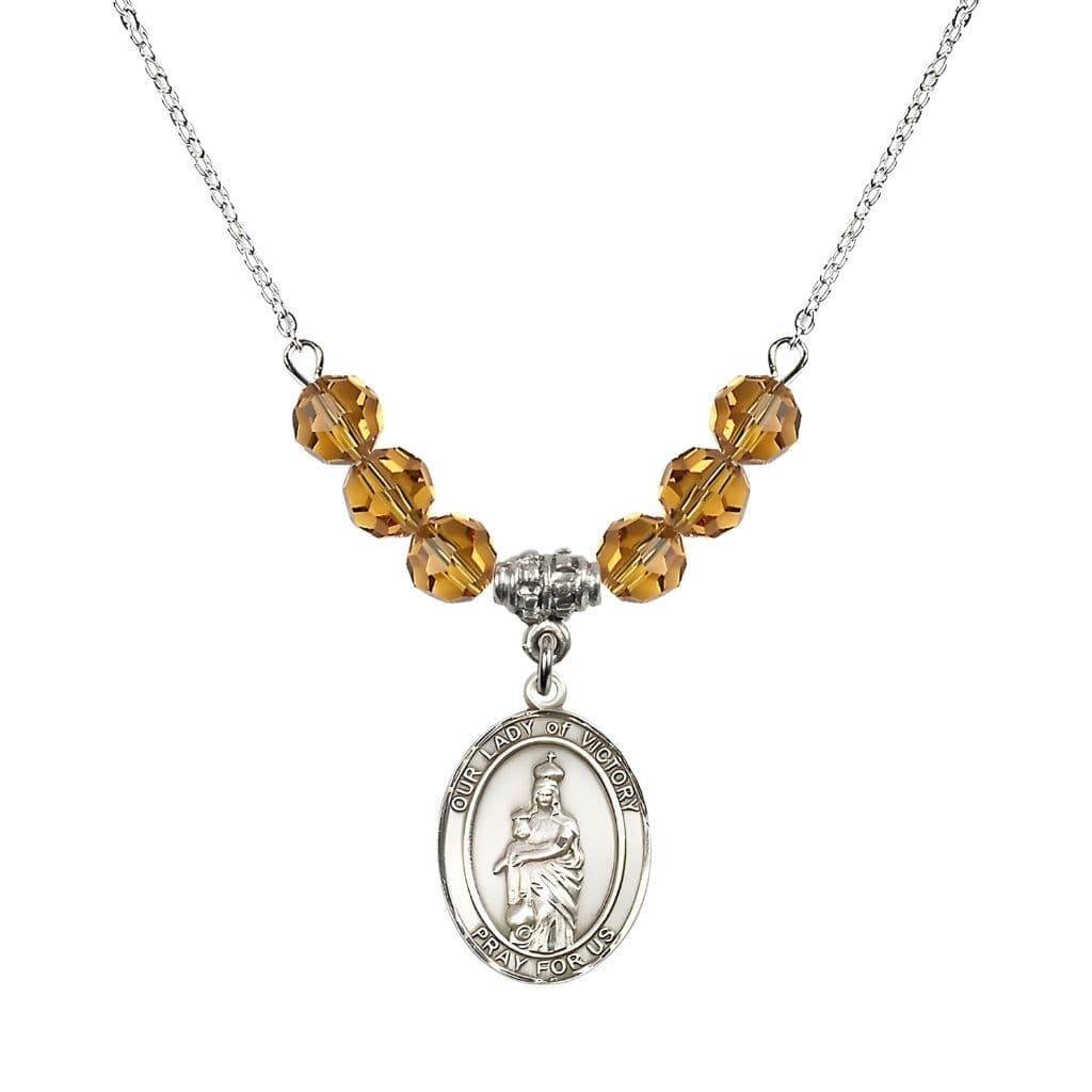 Bliss Our Lady of Victory Sterling Silver 6mm Topaz Austrian Crystal Beaded Necklace with Plated Chain