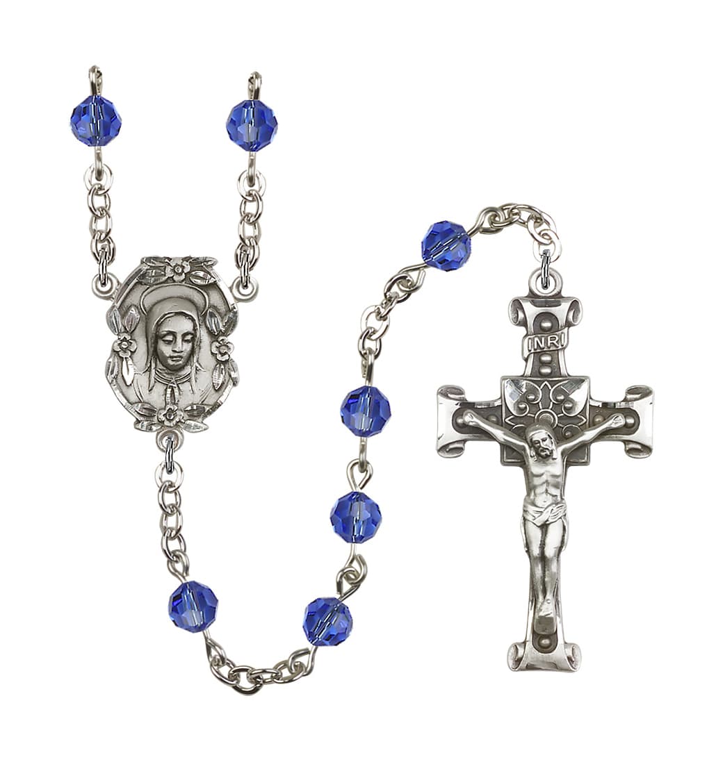 Bliss Handmade Silver-plated Rosary with Madonna Centerpiece, Scroll Design Crucifix and Sapphire 6mm Round Austrian Crystal beads.