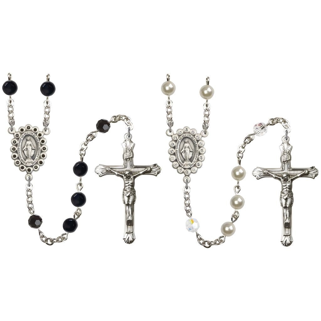 Bliss wedding rosary set pairs elegantly matched his-and-hers rosaries in 6mm Black Onyx beads and 6mm Austrian Creamrose faux Pearl beads with Austrian Crystal Miraculous Medal.