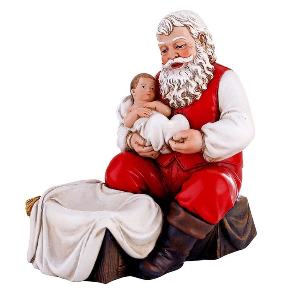 Side view of Avalon Gallery perfectly depicts the heartwarming scene of Santa in prayer, cradling Baby Jesus with tenderness.