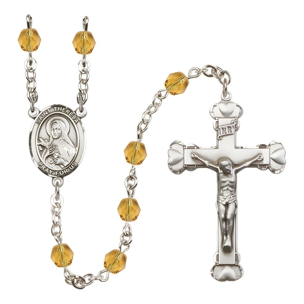 Bliss Birthstone 6mm Topaz Fire Polished Silver-plated Engravable Rosary with Pewter St. Theresa Center and Heart Edge Crucifix