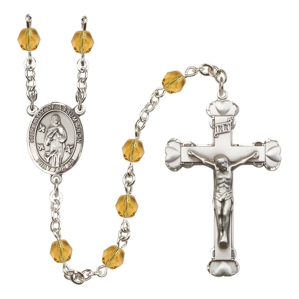 Our Lady of Assumption Engraved Birthstone 6mm Topaz Fire Polished Silver-plated Rosary with Pewter Centerpiece and Heart Tip Crucifix