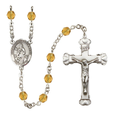 Our Lady of Assumption Engraved Birthstone 6mm Topaz Fire Polished Silver-plated Rosary with Pewter Centerpiece and Heart Tip Crucifix, Bliss Manufacturing