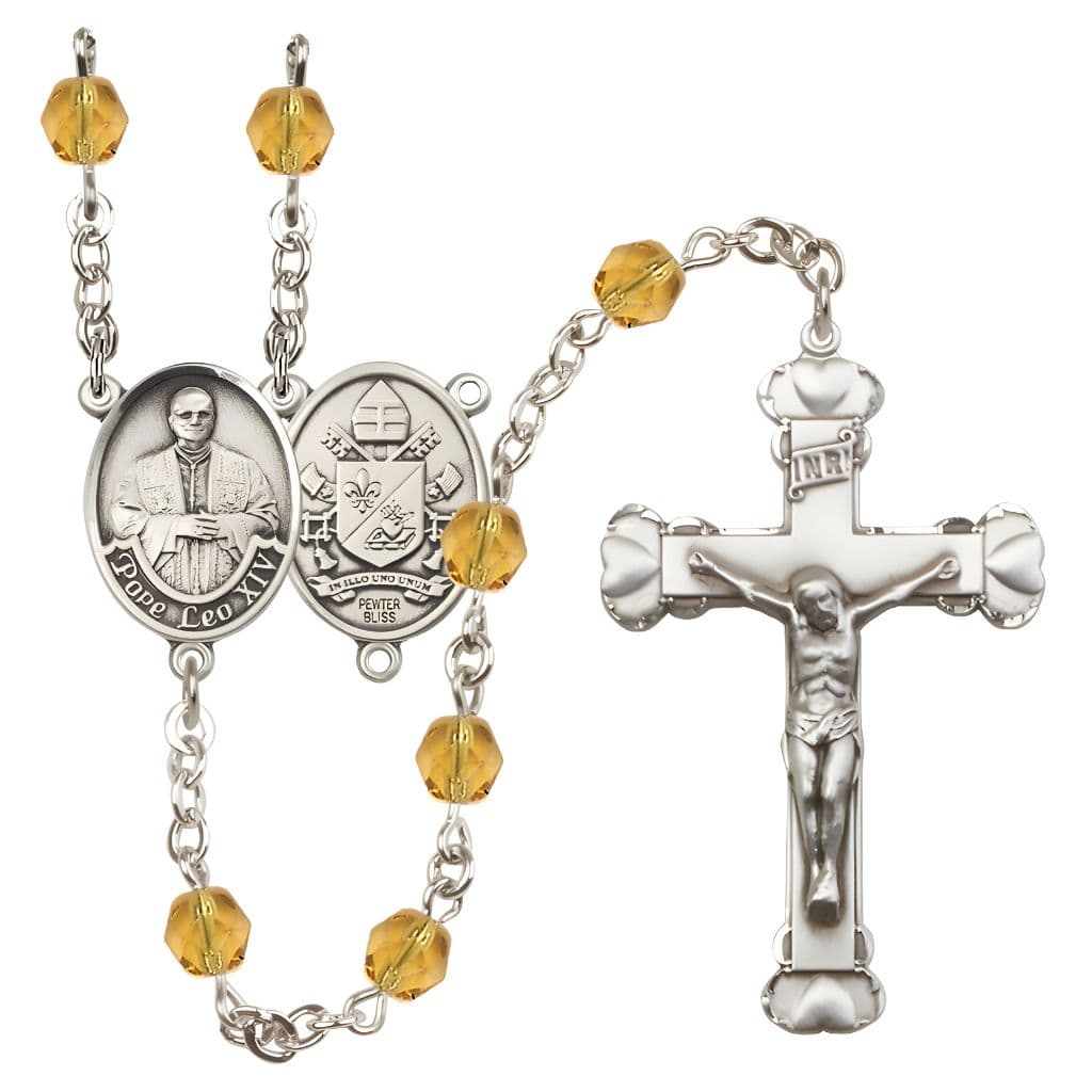 Bliss Pope Leo XIV Birthstone Engravable Rosary with Pewter Center and Heart  Edge Crucifix, 6mm Fire Polished Beads in Topaz for November